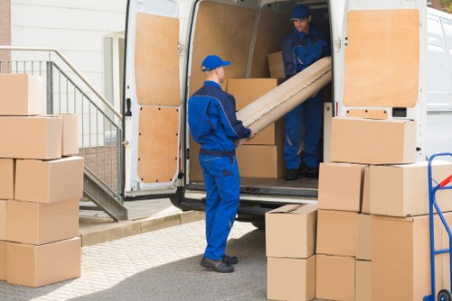 A fleet of well-maintained moving vans ready for dispatch in Watford