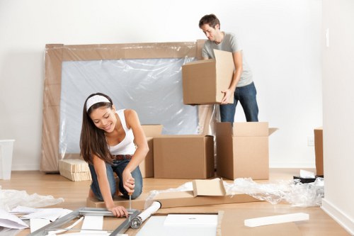 Expert unpackers assembling furniture