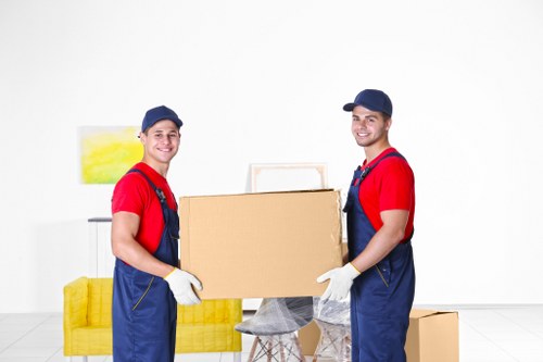 Professional team handling furniture removal in Storage Watford