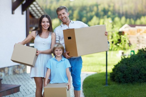 Satisfied customer reviewing their successful move with Man and Van