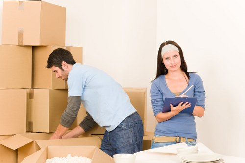Professional movers assisting with loading